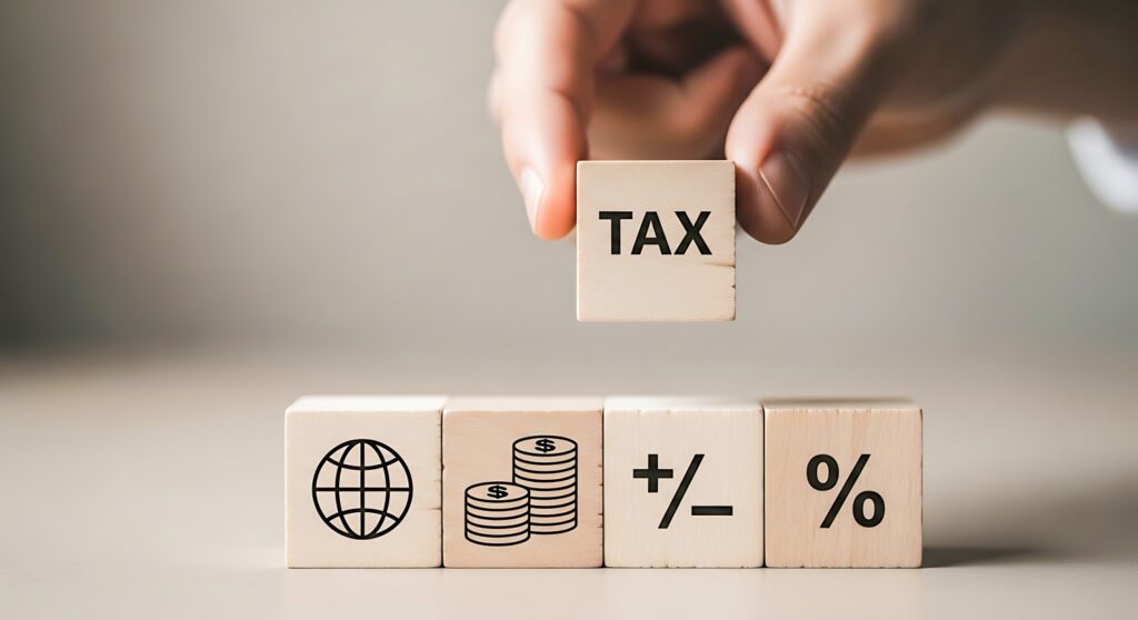 木製ブロックを使った税金(TAX)のコンセプトイメージ